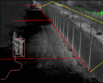 A thermal image of the fence-line with a person highlighted next to the fence